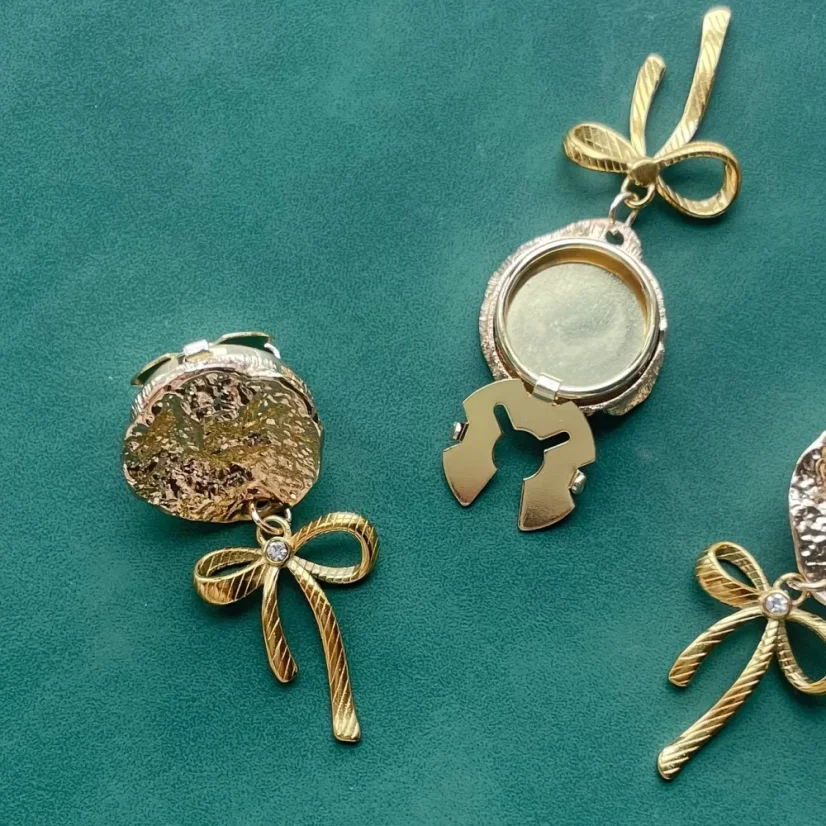 Krycí knoflík Mašle